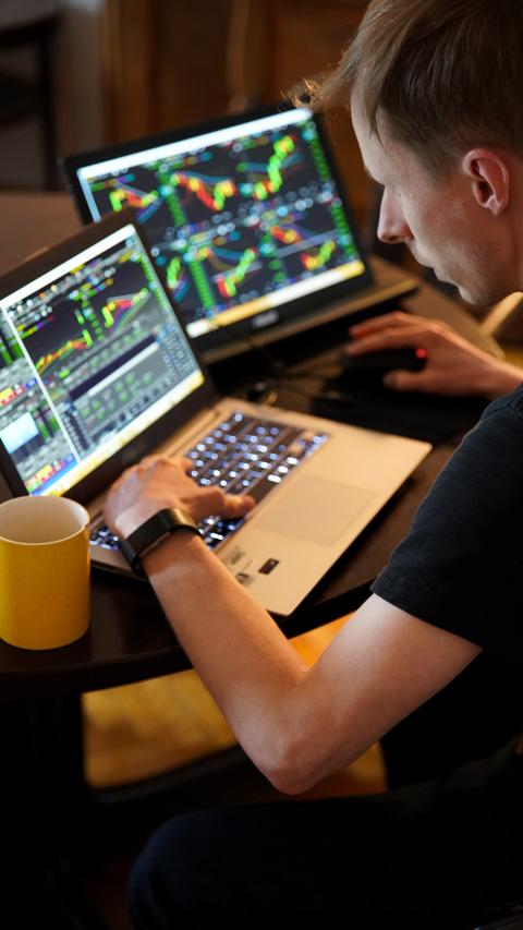 IT consulting workspace with laptop and software development tools